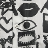 Comme des Garçons All-Over Symbolic graphic print shirt