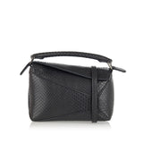 Puzzle mini snakeskin leather bag