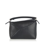 Puzzle mini snakeskin leather bag