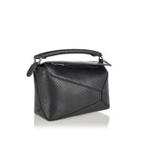 Puzzle mini snakeskin leather bag