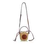 Embossed leather-trimmed faux raffia bucket bag