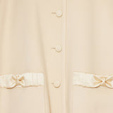 bow-detailed button-up coat