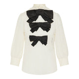 Bow-embellished broderie anglaise cotton blouse