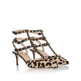 Rockstud pony calfskin pumps