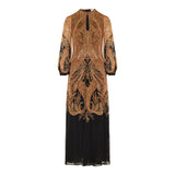 Hypnotic caped maxi dress