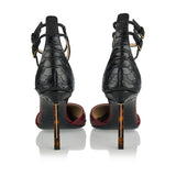 Snake-effect leather pumps