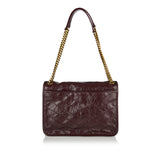 Niki medium leather shoulder bag