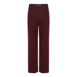 Leather‑trimmed pleated wool flared trousers