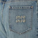 Embroidered‑logo denim jeans