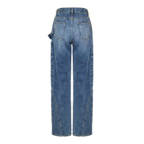 Twisted asymmetric embroidered high‑rise jeans