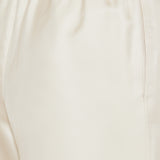 Lars lace‑stitch trousers