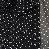 Polka‑dot chiffon neck‑tie sleeveless blouse