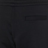 Petal cotton‑jersey barrel‑leg trousers