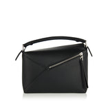 Puzzle Edge small leather bag