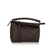 Puzzle Edge mini leather bag