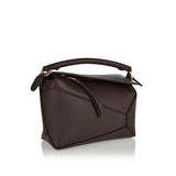 Puzzle Edge mini leather bag