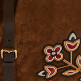 Embroidered leather‑trimmed suede shoulder bag