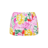 Floral skirt with pink, yellow, and green colors on a white background