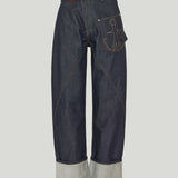 JW Anderson Twisted asymmetric embroidered high-rise jeans