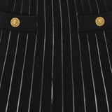 Balmain Button-embellished knitted mini skirt