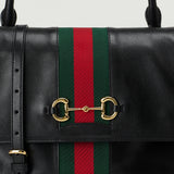 Gucci Paparazzo medium top handle bag