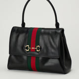 Gucci Paparazzo medium top handle bag