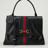 Gucci Paparazzo large top handle bag