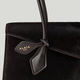 ALAÏA Le Teckel Flap medium haircalf shoulder bag