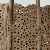 ALAÏA Mina 20 perforated Vienne nubuck bag