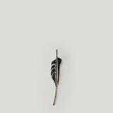 Tom Ford crystal-embellished brass brooch