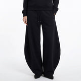 Petal cotton‑jersey barrel‑leg trousers