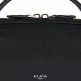 Le Teckel leather clutch bag