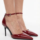 D'Orsay glossed leather pumps