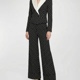 Polka-dot flared trousers