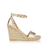 Rockstud metallic leather wedges