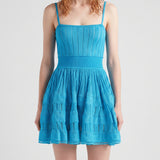 Alaïa Tiered pointelle-knit mini dress