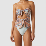 Zimmermann Aster strapless knot-detailed cut-out printed swimsuit